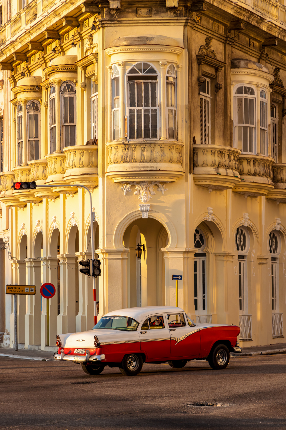 Cuba ornate building and old car