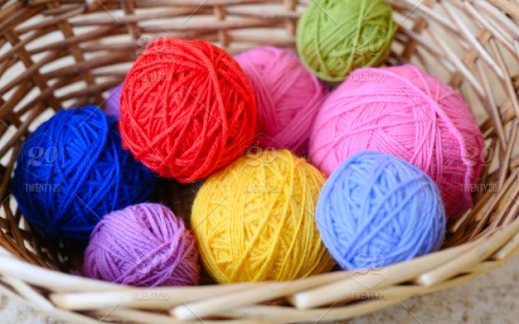 basket of colorful yarn balls